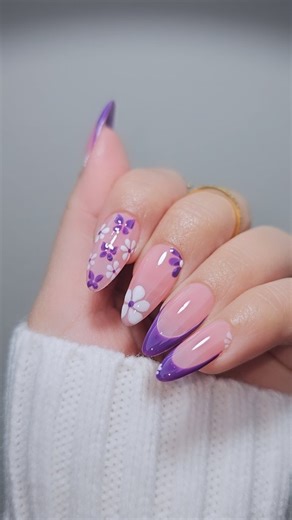 It’s a spring thing!💜🦋🌸. Using @daily_charme ✨️ 907 Amethyst Aura 💜 Diamond shine top coat P02 white art paint Use code DREAMY10 to save 💰 ✨️ #nailsdesign #springnails #spring #nails #almondnails #purplenails #nails #butterflynails #frenchnails #trendingnails #trendingreels #insponails #nails2024 | Dreamy Nails