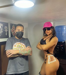 Messi superfan Miss BumBum films herself getting his autograph tattooed on bum
