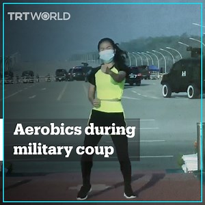 A woman streamed her regular aerobics class as military convoys closed in on the government in Naypyidaw, Myanmar. On February 1, Myanmar's military took control of their democratically elected government and declared a year-long state of emergency. | TRT World