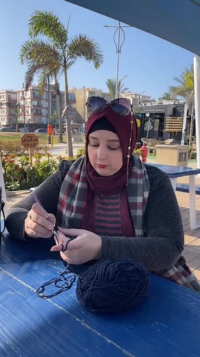 Knitting Techniques in a Scenic Outdoor Setting