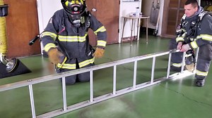 Firefighters face many obstacles when fighting fire, including making hasty escapes through narrow openings to save their lives. Here’s an inside glimpse into Fire Station 4 A Team’s self-rescue training. The training simulates having to breach through a wall and escaping a room between the wall studs which are 16" apart. The rungs of this ladder are 14" apart. This drill gives firefighters the confidence to know they can make it through a space that is even narrower than what they may encounter