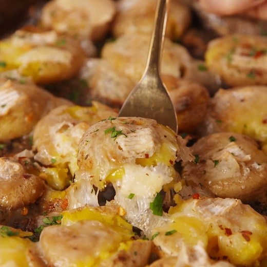 It's official: Brie Smashed Potatoes are the new tater tots. Full recipe: http://dlsh.it/zSJcTsC | Delish