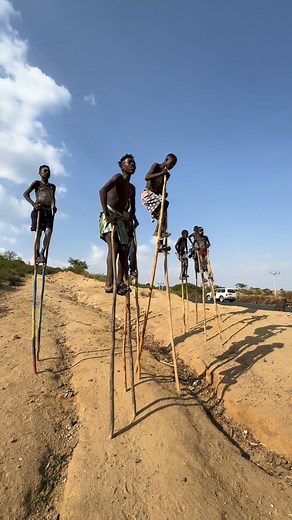 2.4M views · 29K reactions | The Banna boys of Ethiopia's Omo Valley use stilts during community festivals and celebrations. This act combines balance, skill, and fun, and symbolizes the transition from childhood to youth. The young men dance and perform on the stilts while the community cheers them on with songs and drums, displaying pride and cultural vitality. #inspirationofafrica | Quim Fàbregas - Fotografía y Viajes. | Facebook