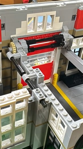 HOF Builder on Instagram: "Loving how we can operate the Fire Brigade door from the back of the building! #lego #legoreels #legobuild #moc"