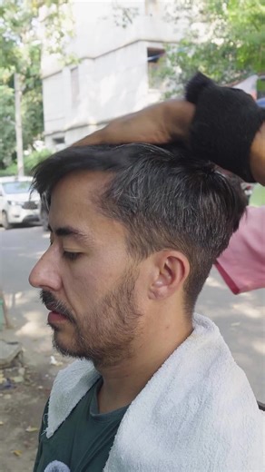 A traditional ASMR street barber session at Madhav Salon in New Delhi. Relax with a face wash and massage in the heart of the city. #oddlysatisfying #satisfysingsound #asmr #headmassage #asmrsleep | Nomad Barber