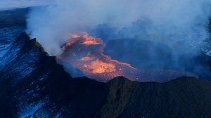 Aerial footage shows lava pouring out of Icelandic volcano