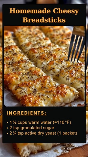 Homemade 🌕 Cheesy Breadsticks Ingredients Here’s everything you need to make these cheesy breadsticks: 1 ½ cups warm water (about 110°F/43°C) 2 teaspoons sugar 2 ¼ teaspoons active dry yeast (1 packet) 3 ½ cups all-purpose flour 2 tablespoons olive oil (plus extra for greasing) ..... Full Recipe in Coʍmеոτ 💬 🌟 | Easy Recipe Mama's
