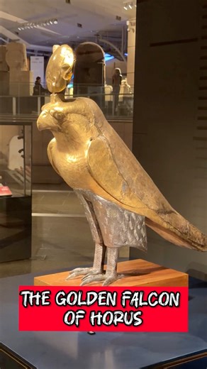 The Golden Falcon of Horus: A Vessel of Divine Power Inside the Grand Egyptian Museum stands one of the most enigmatic sacred figures of ancient Egypt. This statue represents Horus, the falcon god of the sky, the sun, war, and divine protection — shown in his pure avian form, not as a man. His body is covered in gold, his legs are crafted from silver, and above his head rests a golden sun disk, symbolizing sacred solar authority. According to ancient Egyptian belief, this statue was not merely s