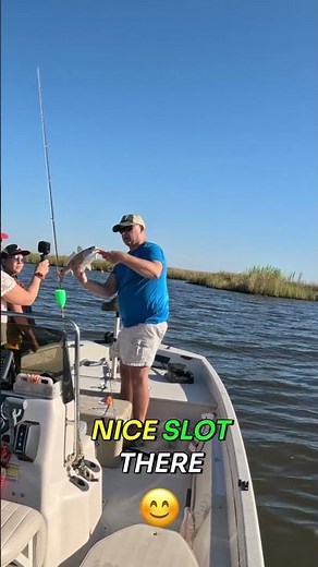 Fisherman Catches a Perfect Slot Redfish