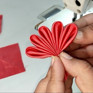 1.4M views · 10K reactions | Make this beautiful Fabric Flower using easy sewing tricks/ Learn easy sewing methods and tricks with Knotty Stitches #Crafts #stitching #sewingtipsandtricks #sewinghacks #lifehacks #kurti #neckdesign #fabricflower | Knotty Stitches | Facebook