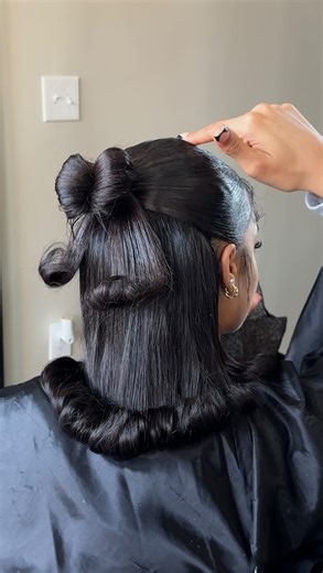 DMV HAIRSTYLIST on Instagram: "In depth bun tutorial for my viral Christmas ribbon bun🤭🎀 Hope this one has better step by step for you guys