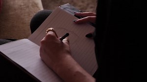 Drawing in a notebook - Free Stock Video Footage | Coverr