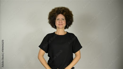 Female interpreter says the phrase everyone deserves respect in Brazilian sign language.