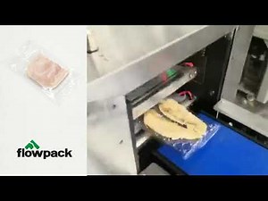 flow pack machine with vacuum system for dry food packaging.