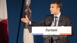 France's Macron unveils priorities as race tightens