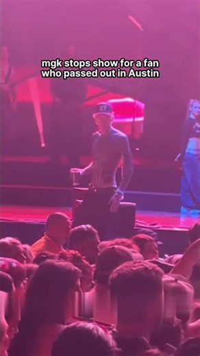 mgk stopped show when a fan passed out, gave them water, and went over with medics. The fan is ok!