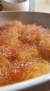 Greek Ekmek Kataifi (Custard Kataifi) Yields: One 9x13 inch pan (approx. 15-20 servings) Components & Ingredients Part 1: Syrup for the Kataifi Base 400g (2 cups) granulated sugar 480ml (2 cups) water 1 tbsp fresh lemon juice 1 cinnamon stick 2-3 whole cloves 1 strip of lemon peel Part 2: Kataifi Base Layer 450g (1 lb) kataifi pastry (shredded phyllo), thawed 200g (¾ cup 2 tbsp) unsalted butter, melted Part 3: Rich Custard Layer 1 liter (4 ¼ cups) whole milk 200g (1 cup) granulated sugar 100g (⅔