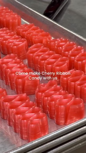 Our handmade, cherry ribbon candy is bright just like 2026 is going to be for all of you 🍒✨ #hammondscandies #candy #candyfactory #sweets #denver | Hammond's Candies since 1920