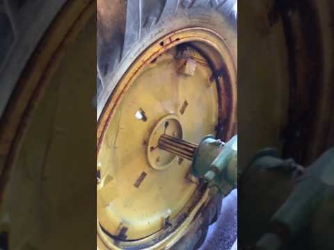 Removing tires with rims from John Deere Model A tractor without moving hubs!!