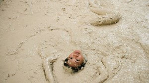 Cathy Teasing in Mud