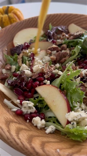 This Fall Salad is a delicious blend of mixed greens, apples, pomegranate seeds, blue cheese, and candied pecans tossed in a homemade vinaigrette. It’s easy, delicious, and a great side to include with a meal!😋 What is your favorite salad to make? Recipe below! Ingredients: For the salad: * 7 cups mixed spring greens * 1 1/2 cups sliced apples I prefer Pink Lady or Honeycrisp * 1/2 cup pomegranate seeds * 1/2 cup high quality blue cheese crumbled * 1/2 cup candied pecans coarsely chopped For th