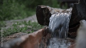 A crystal-clear spring stream flows gently, bringing peace and freshness to everything it touches Stock Video