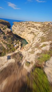 This is Gozo 🇲🇹 This is what you should know👇 . Comment “location” for the exact spot and don’t forget to hit follow @johnfabiomb if you want to uncover these 📍5 Hidden Gems of Malta 🇲🇹 . 📍Wied il-Għasri – Gozo’s Hidden Canyon of Turquoise Waters 🌊🗿 ✔️ Best time to visit? Early morning or late afternoon — fewer people, golden light, and calm seas. ✔️ How to get there? Drive towards Żebbuġ, Gozo, and follow signs to Wied il-Għasri. Park at the end of the narrow road and walk down the lim