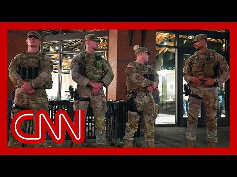 National Guard begins carrying firearms in DC