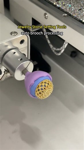 shows automatic brooch processing using dedicated stone setting tools.