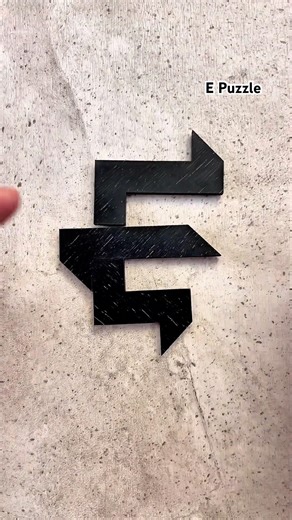 This E puzzle has a trick nobody expects #tangram #mindblown