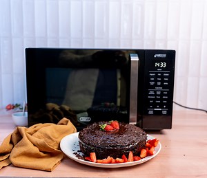 3K views · 23 reactions | Turn your microwave into a mini bakery! ✨ Try this easy, delicious microwave cake recipe and satisfy your sweet tooth in minutes: 100ml sunflower oil, plus extra for pan 175g caster sugar 140g plain flour 3 tbsp cocoa 3 tsp baking powder 2 large eggs 1 tsp vanilla essence chocolate sprinkles, to serve For the chocolate ganache 100g dark chocolate, broken into pieces 5 tbsp double cream #DefySA #ArtOfLiving #DefyReels #Microwave | Defy | Facebook