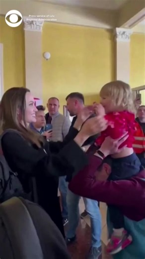 Angelina Jolie tickles and plays with a little girl while on a humanitarian mission to Ukraine. #AngelinaJolie #Ukraine