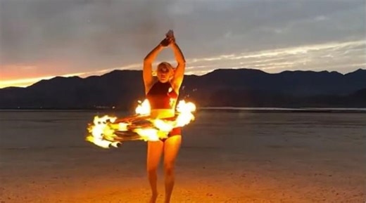 WATCH: Circus performer sets Guinness World Record with her fiery hula hoop