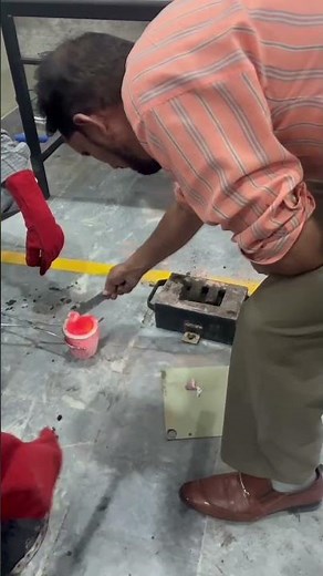 Foundry shop.Alminum casting into mold. Green sand casting.