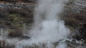 Explosion Breaks a Rock into many tiny parts by the help mechanism to remove the unbounded part of rock from the mountain. High quality Full HD footage