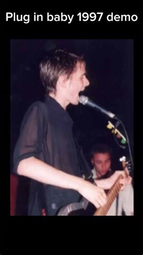 Muse Plug in baby demo 1997 vs live version Glastonbury 2004 #pluginbaby #muse #demoversion #goat