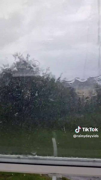 Heavy Rain Pouring Down the Window