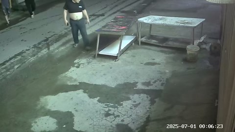 Chubby man breaks table when he leans on it outside shop