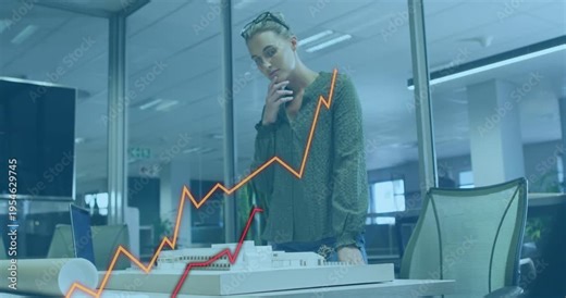 Architect leaning over scale model in office, animated graphs appearing, assessing project impact
