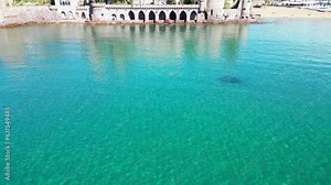 Drone view of the Chateau De Theoule castle on the seacoast in Theoule-sur-Mer, France