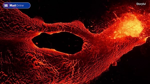 Extraordinary footage of Icelandic volcano spewing lava emerges