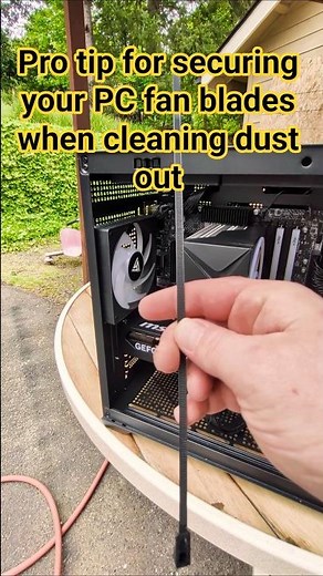 Pro tip the best way to secure your fan blades when cleaning dust out of your Gaming PC.