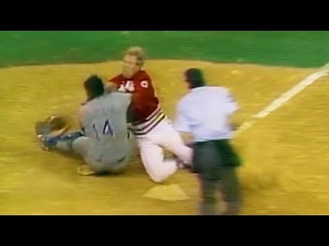 Norm Charlton collides with Mike Scioscia at home plate