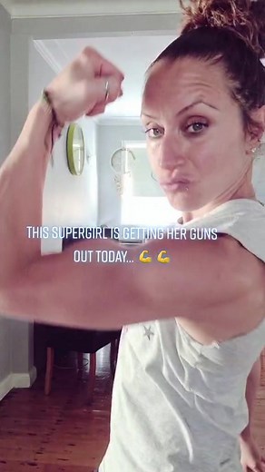 Powerful Supergirl Flexing Biceps Challenge