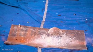 Can a solid glass ball survive a 150-foot drop?