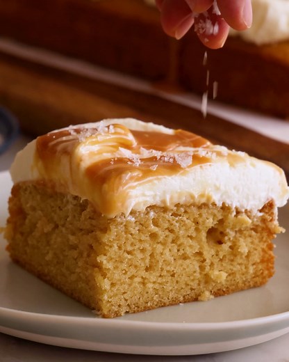 A stir-together cake? YES PLEASE! The most incredible Salted Caramel Cake just so happens to be in my NEW book Preppy Kitchen Super Easy! This simple cake is melt in your mouth amazing and full of caramel flavor. All topped with a luscious cream cheese frosting swirled with more caramel and sprinkled with sea salt for some salty sweet perfection. The recipe is only in the book so order your copy at Amazon, Barnes and Noble or your favorite book store! #preppykitchen #baker #recipevideo | Preppy 