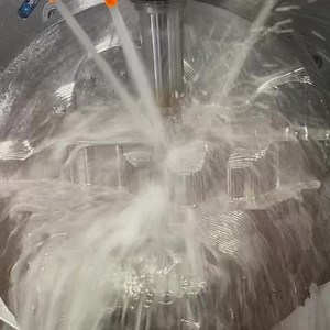 53K views · 912 reactions | I am further along on my Crazy Titanium Personal Project Now… Just flipped the 5 axis table down and now I am coming at it from the side. Switched from the Kennametal Harvi 3 End Mill to the Harvi 1 TE because now I am going to start ramping into some tight pockets etc. Will keep showing you guys the progress as I move along. Machine: Doosan DVF8000T Workholding: Schunk Coolant: Synergy 735 from Blaser. Programming: Mastercam | Titans of CNC Machining | Facebook