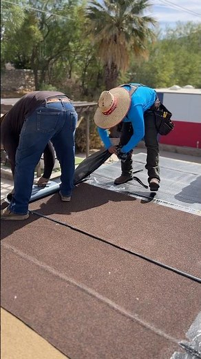 Texas roofers team up to install peel & stick on flat Roof! 🇺🇸 #roofing #construction #homedecor