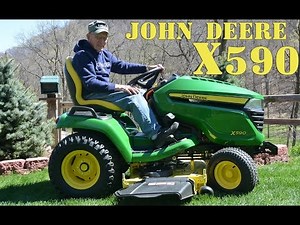 New John Deere X590 Lawn Tractor cutting grass. Action Time!