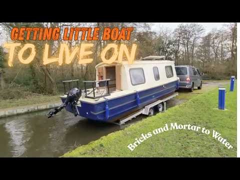 10. Getting the little boat to live on, while Dutch barge in dry dock
